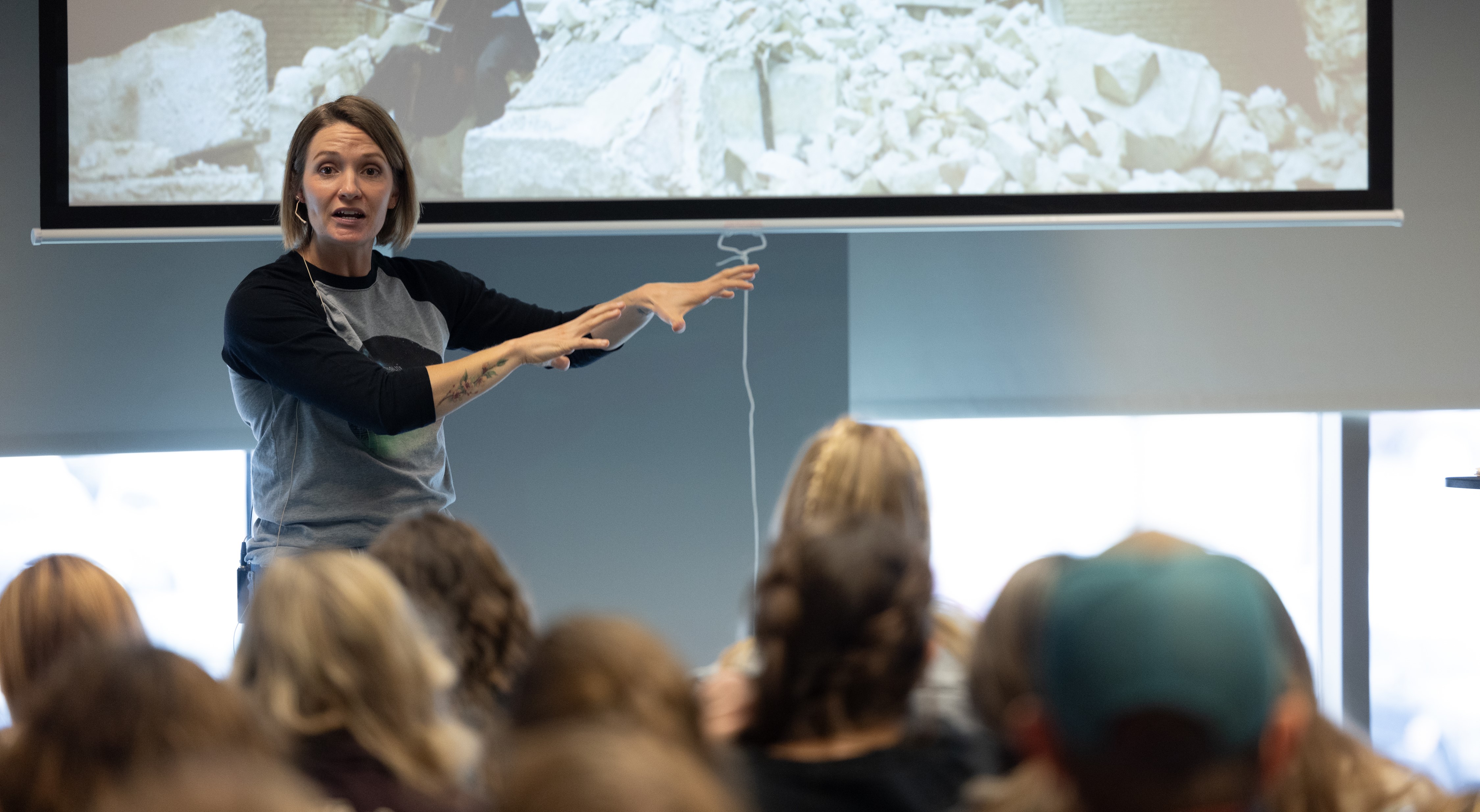 Megan speaking in a classroom setting